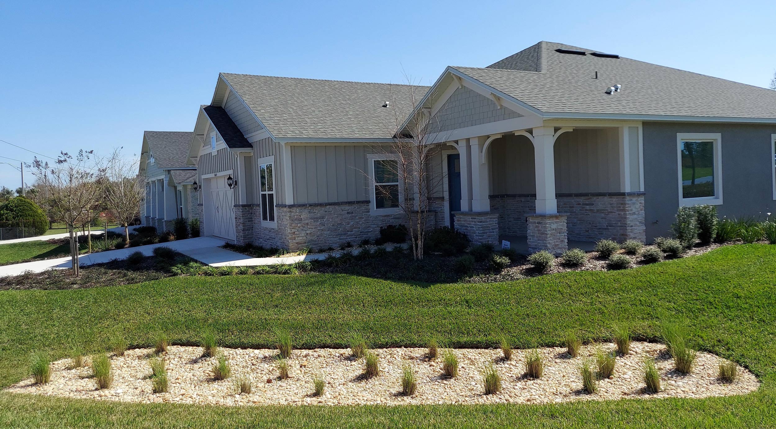 House with a neat front yard landscape